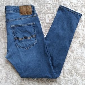 AEO Distressed Extreme Flex Skinny Jeans 31/30 Blue